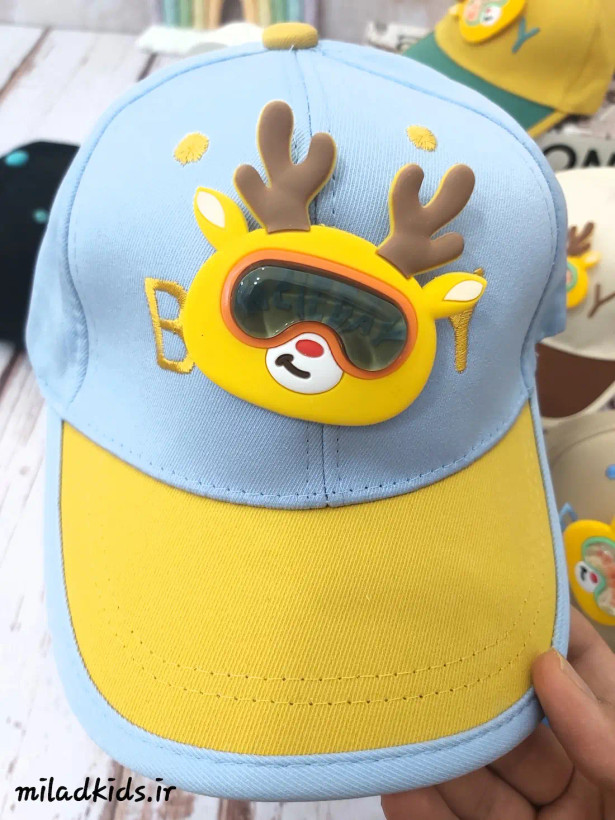کلاه کپ کودک مدل عروسک گوزنی برجسته متحرک رنگ آبی روشن-خردلی