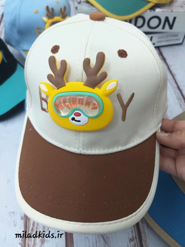 کلاه کپ بچگانه مدل عروسک متحرک گوزنی رنگ شیری_شکلاتی