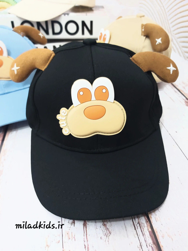 کلاه کتان کودک بیسبالی شش ترک مدالسگ گوش دار رنگ مشکی نمای روبرو