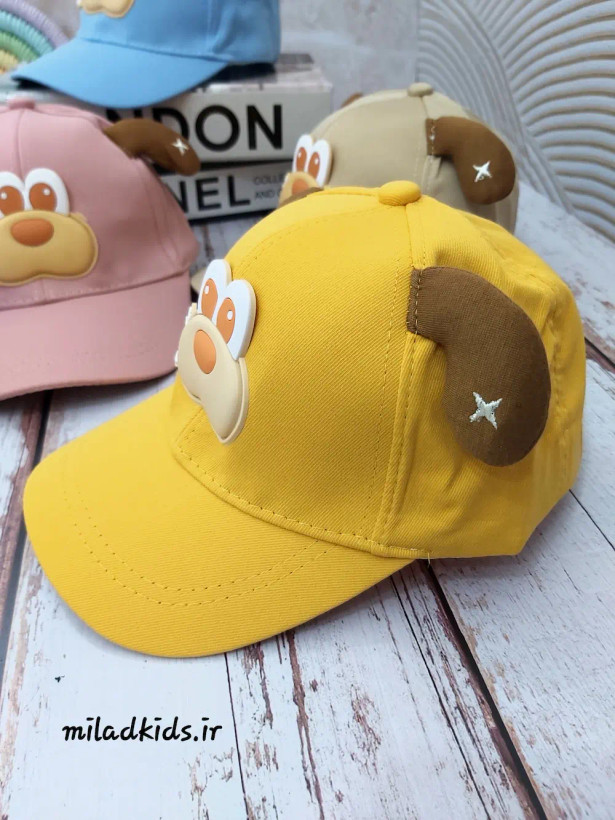 کلاه کتان بچگانه کپ شش ترک مدل سگ گوش دار رنگ خردلی