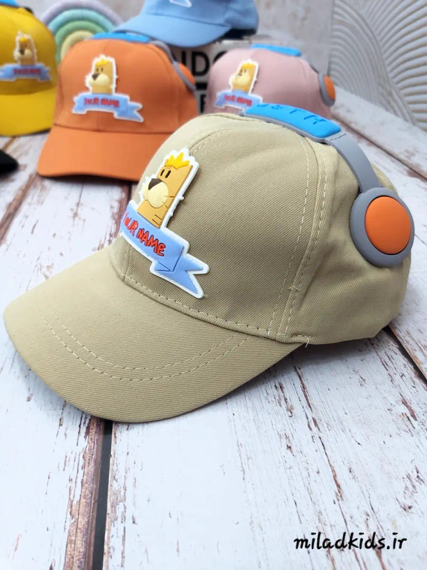کلاه کتان کودک بیسبالی مدل هدفونی رنگ کرم