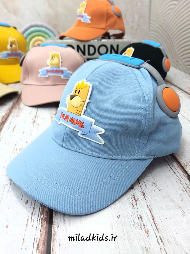 کلاه کتان وارداتی بچگانه بیسبالی شش ترک مدل هدفونی رنگ آبی روشن