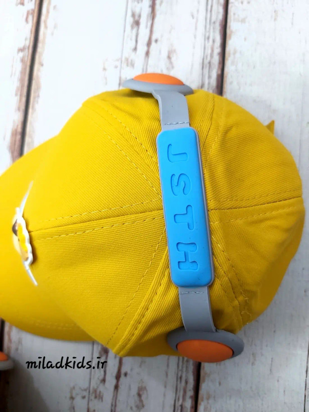 کلاه کتان وارداتی بچگانه کپ مدل هدفونی از نمای بالا وهدفون سیلیکونی رنگ خردلی