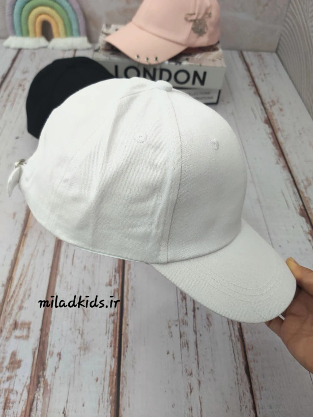 نمای نیمرخ کلاه کتان دخترانه کپ پرسینگ حلقه ای رنگ سفید